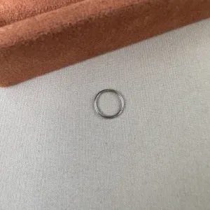 Piercing argola articulada