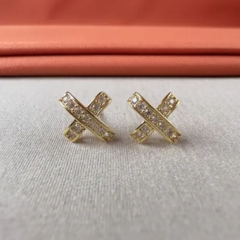 Brinco X cristal 