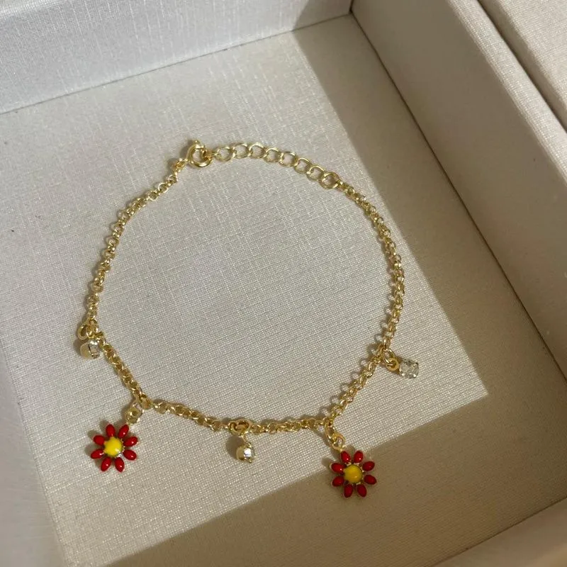 Pulseira infantil margarida vermelha